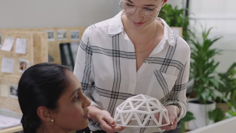 creative business woman engineers design geodesic dome 3d model indian team leader woman training colleague on computer software in modern startup office designers sharing development project