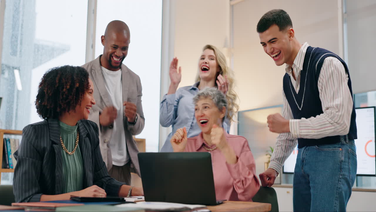 Business team celebrating success in the office