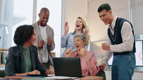 business team celebrating success in the office