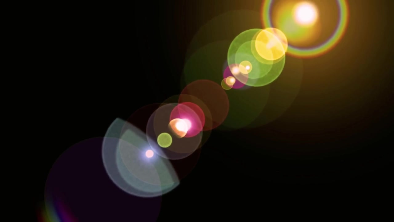 Abstract Lens Flare Effect Moving Across Dark Background