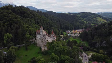 aerial view of ancient bran castle, gloomy day in carpathian mountains, romania