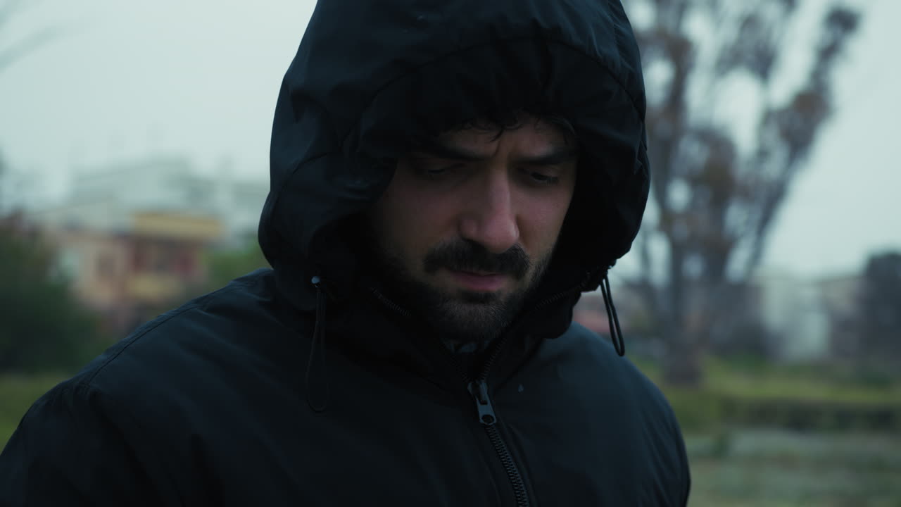 Worried And Sad Man With Hoodie Outdoors, Close Up