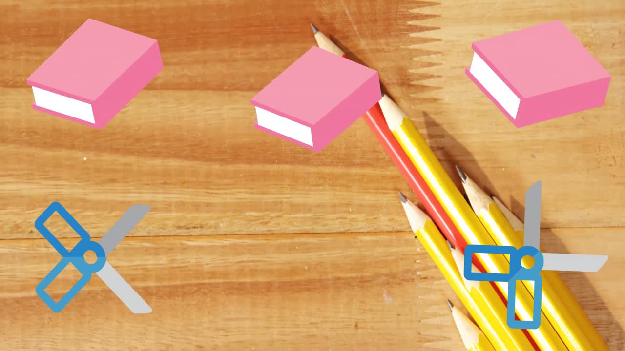 학교 책상 에 있는 연필 위 에 움직이는 가위 와 교과서 의 애니메이션