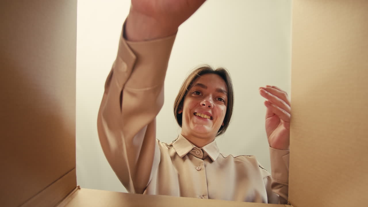 E-commerce storage shop, woman packing goods and clothes for second hand delivery market, dedicated Packaging and Shipping Workspace with Supplies and Technology for efficiency, online sales.