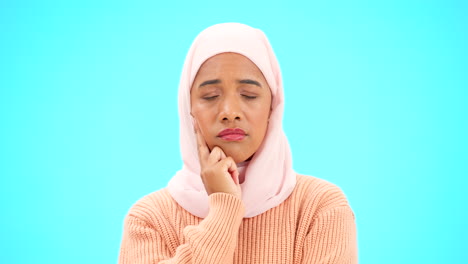 Muslim-woman,-thinking-and-idea-with-hand-on-face