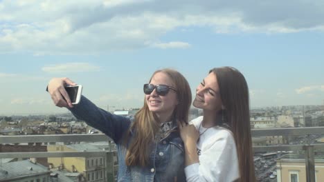 selfie style portrait of two teen girl friends