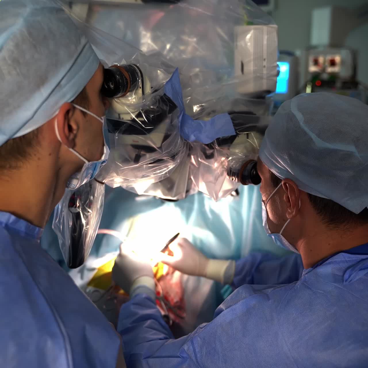 Neurosurgeons using high-precise microscope for operation. Innovative equipment to help the professionals during surgeries. Close up