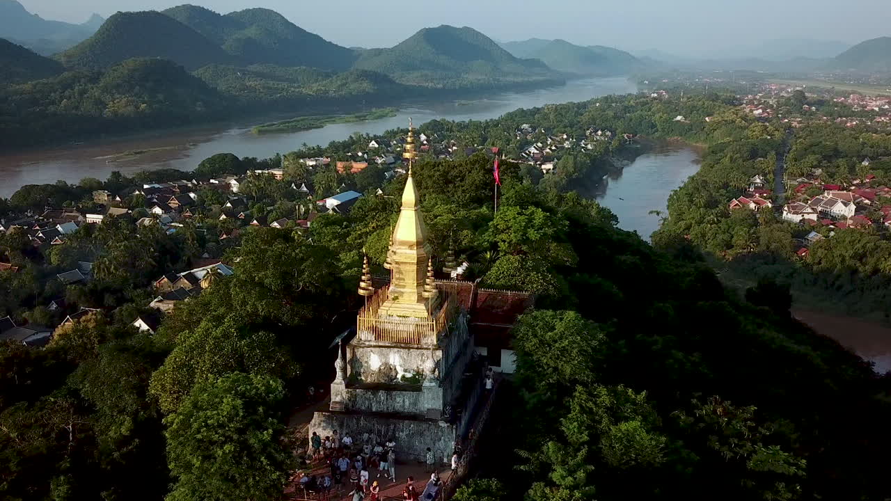 Laos, Luang Prabang, Aerial View of Buddhist Temple on Top of Hill With Amazing Sunset and Mekong River View