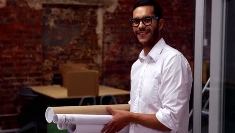 Handsome-architect-smiling-at-camera