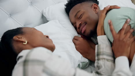 Wake-up,-relax-and-black-couple-sleeping-in-bed