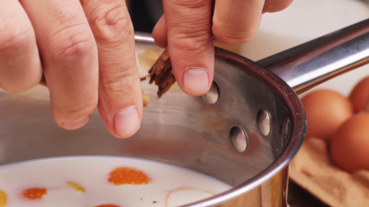 Chef Cooking Spanish traditional food, catalonian dessert, crema catalana, catalan cream, spanish dessert close up, cooking.