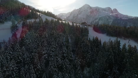 Aerial-drone-of-snowy-ski-trails-in-the-Alps-in-wintertime