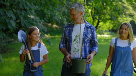 family planting a tree