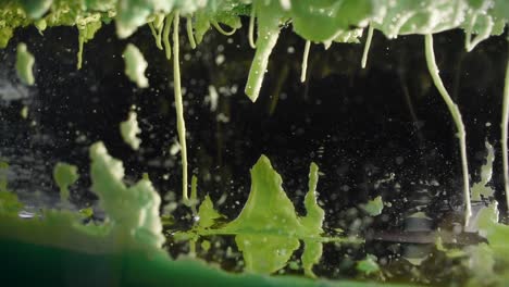 rapidly shooting oil bubbles with spinning tornado and worm-like floating creature