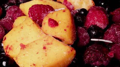 macro time-lapse of melting exotic fruits for vitamin shake for breakfast