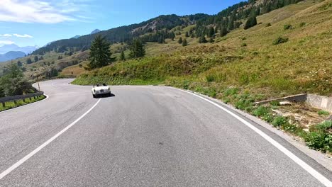 car driving through scenic mountain road