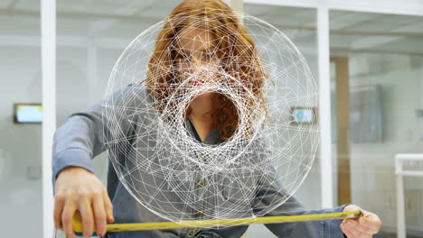 animation of white shapes over caucasian businesswoman holding tape measure