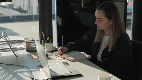 car service manager working at desk in office