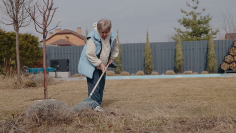 senior woman gardening in backyard