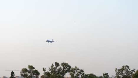 airliner approach the runway, sky background with copy space, static