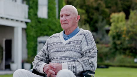 Senior,-man-and-wheelchair-in-garden-relax