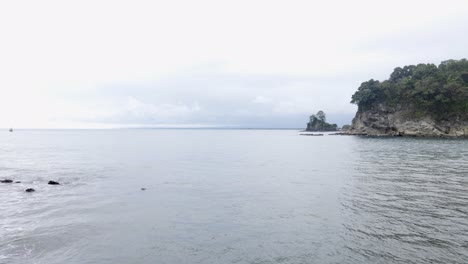 calm ocean water in the secluded bay of playa la vaca on the central pacific coast of costa rica