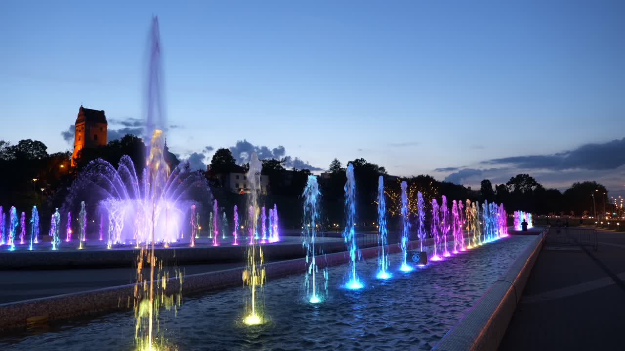 Multimedia Fountain Park illuminated at night in city of Warsaw in Poland.