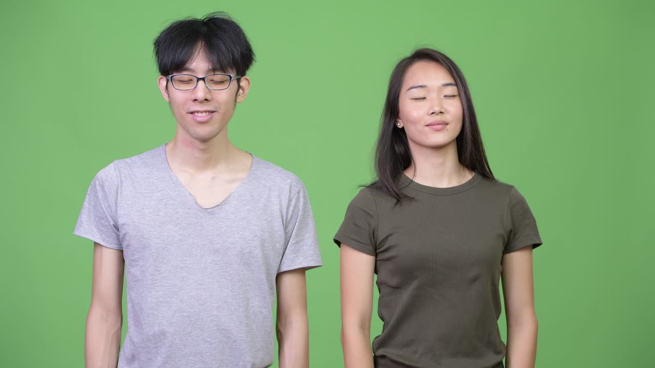 Young Asian couple relaxing together