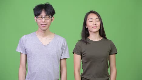young asian couple relaxing together