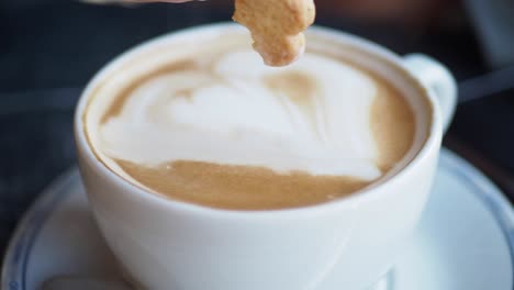 a cup of latte with heart latte art