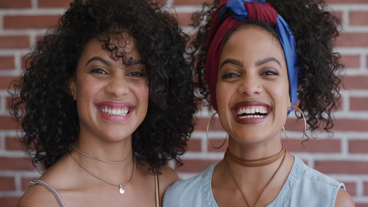 portrait beautiful young twin sisters laughing enjoying happy lifestyle together lovely siblings embracing looking cheerful family real people series