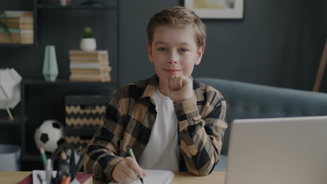 boy studying at home