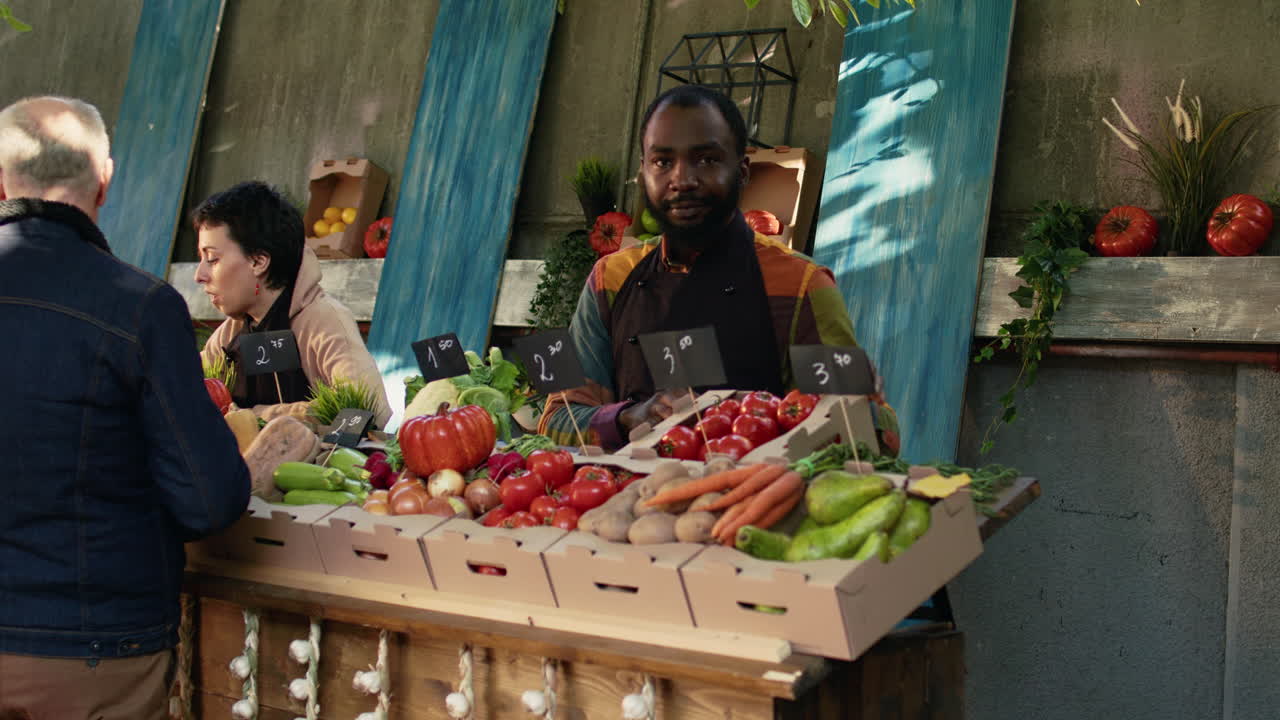 People Selling Produce at a Farmers Market