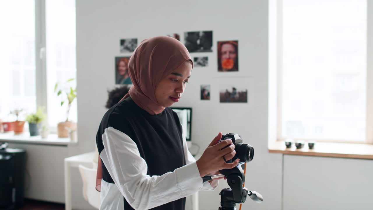 Photographer setting up camera