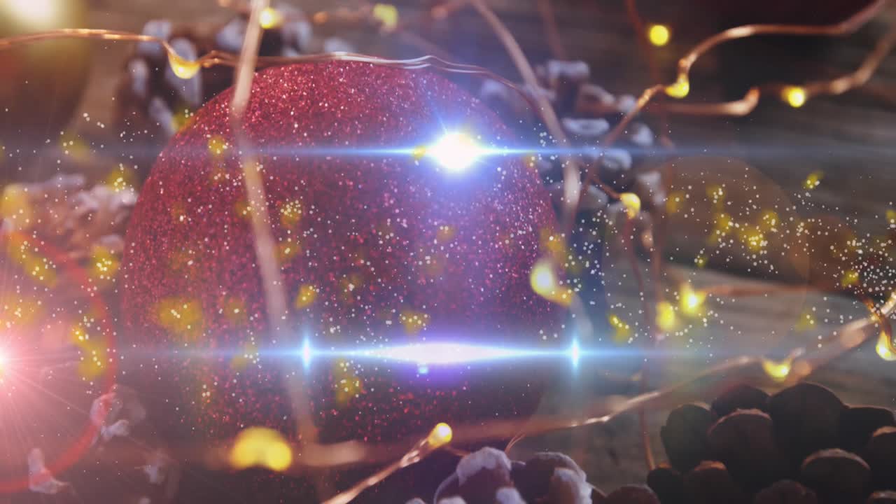 크리스마스 장식품 위에 떨어지는 빛과 별의 애니메이션