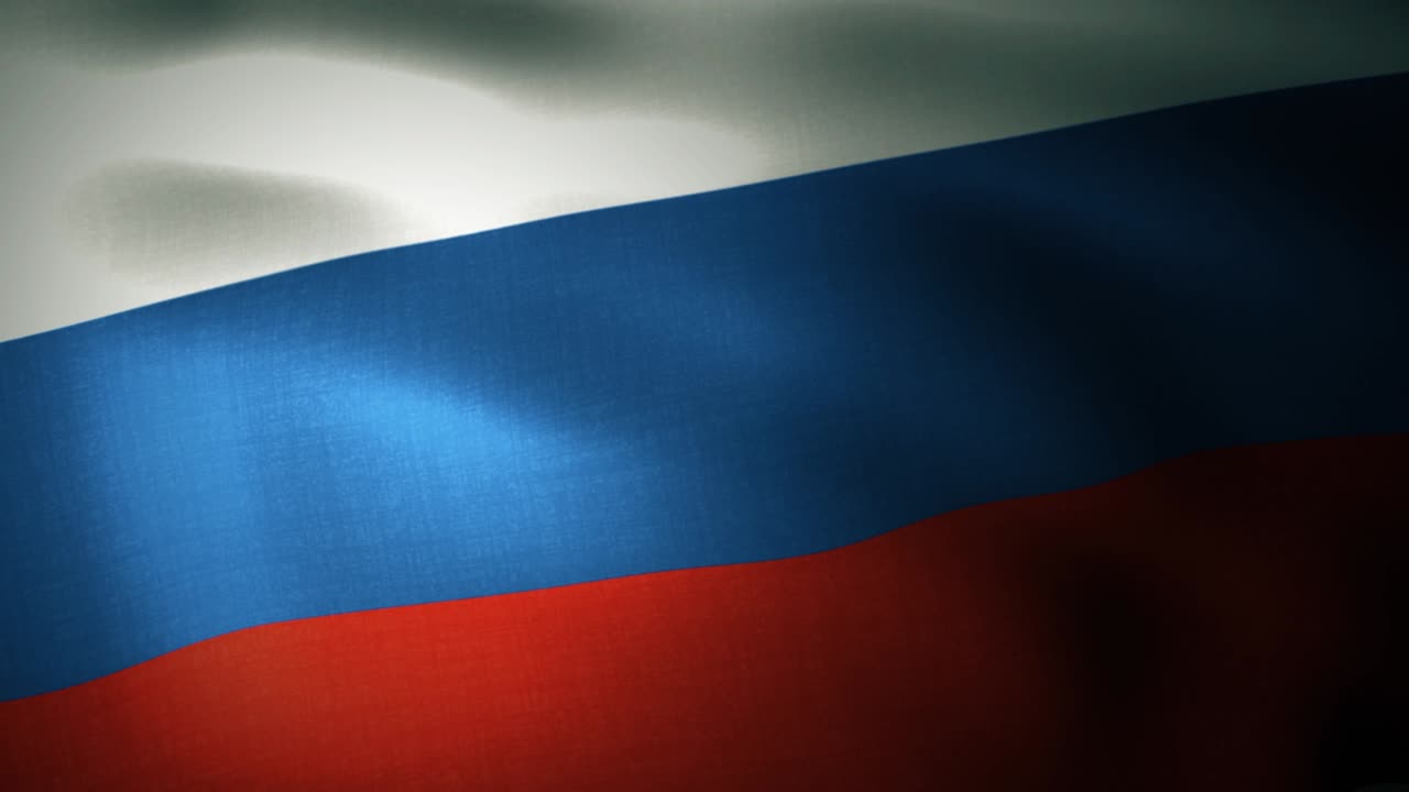 Russian Flag waving in wind in slow motion. Close up of Russian flag