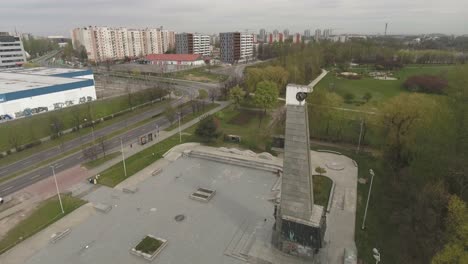 urban skate park situated on a large square with a communist monument in central europe