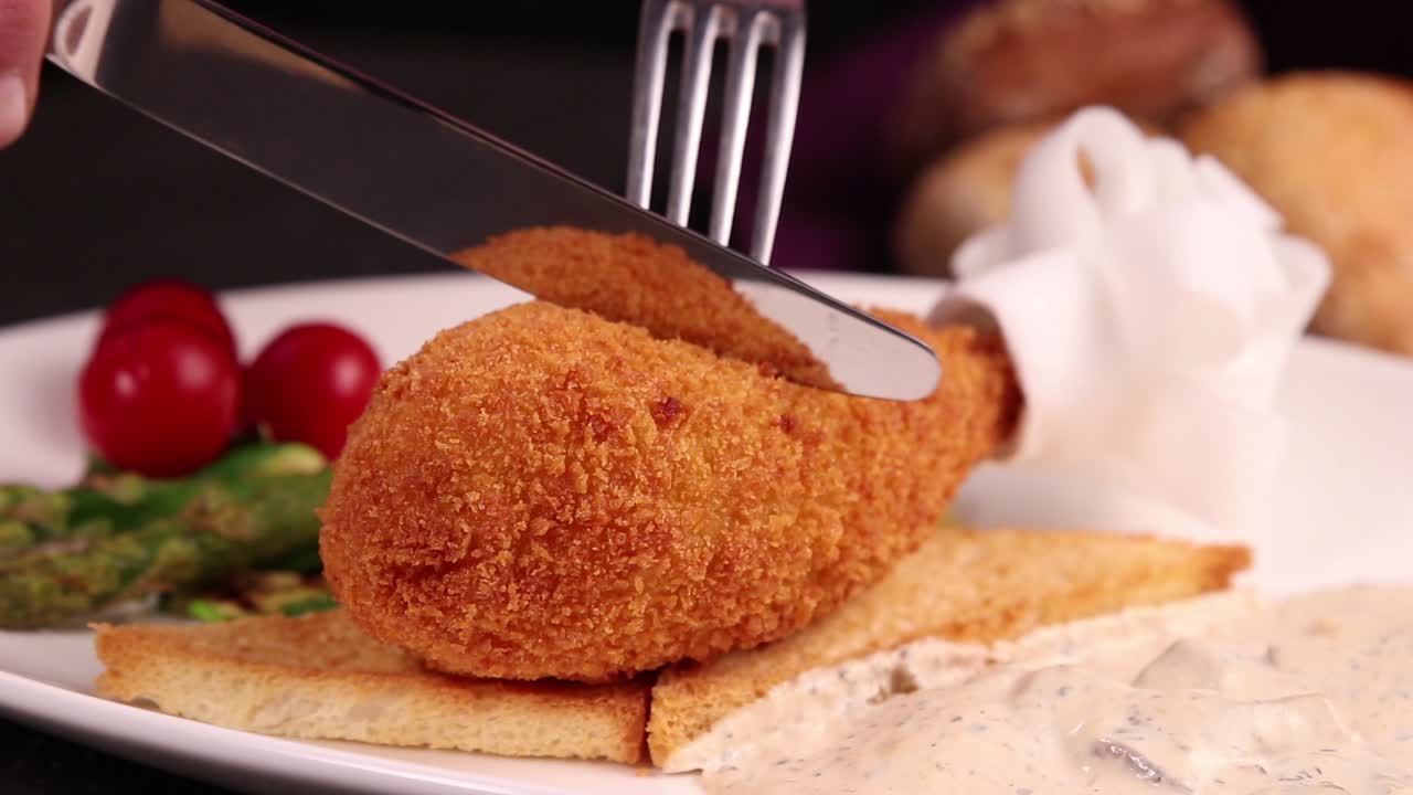 Delicious Breaded Chicken Cutlet with Toasted Bread and Sauce