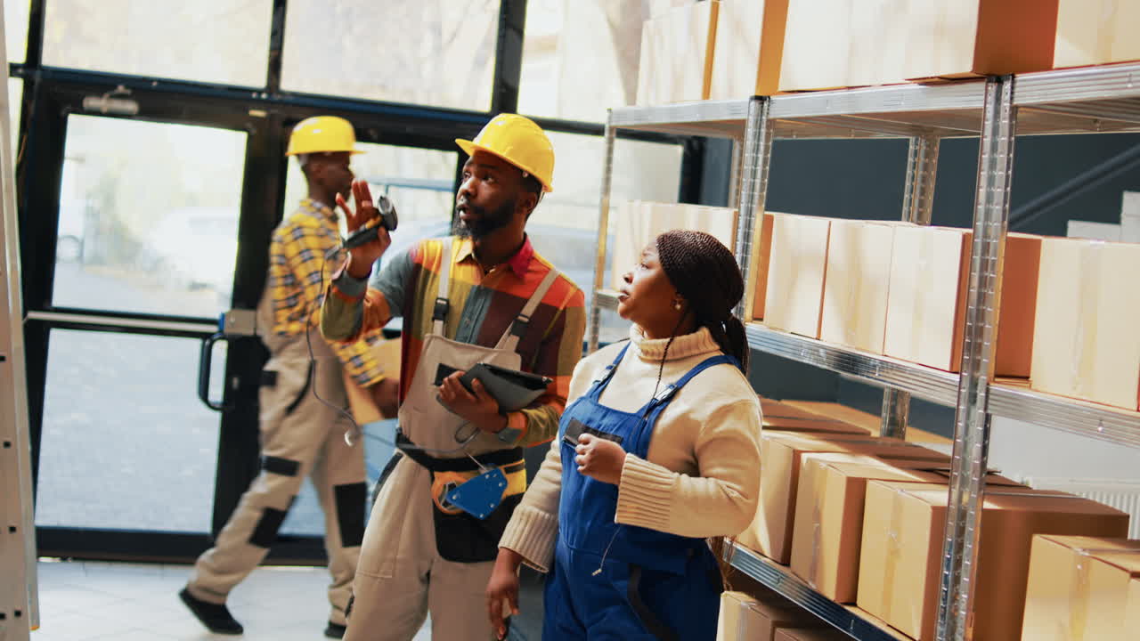 Warehouse workers checking inventory