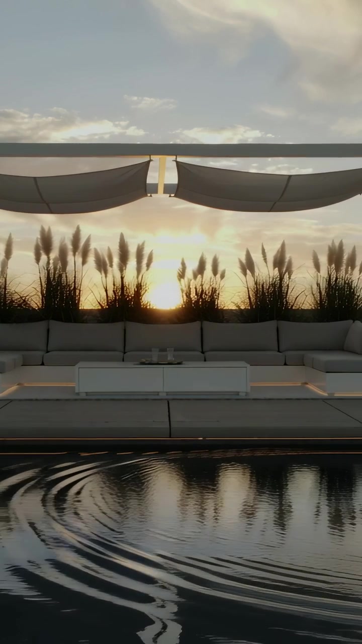 Vertical video: Splashing at right pool edge sending ripples, pool warping sofa shapes on rooftop