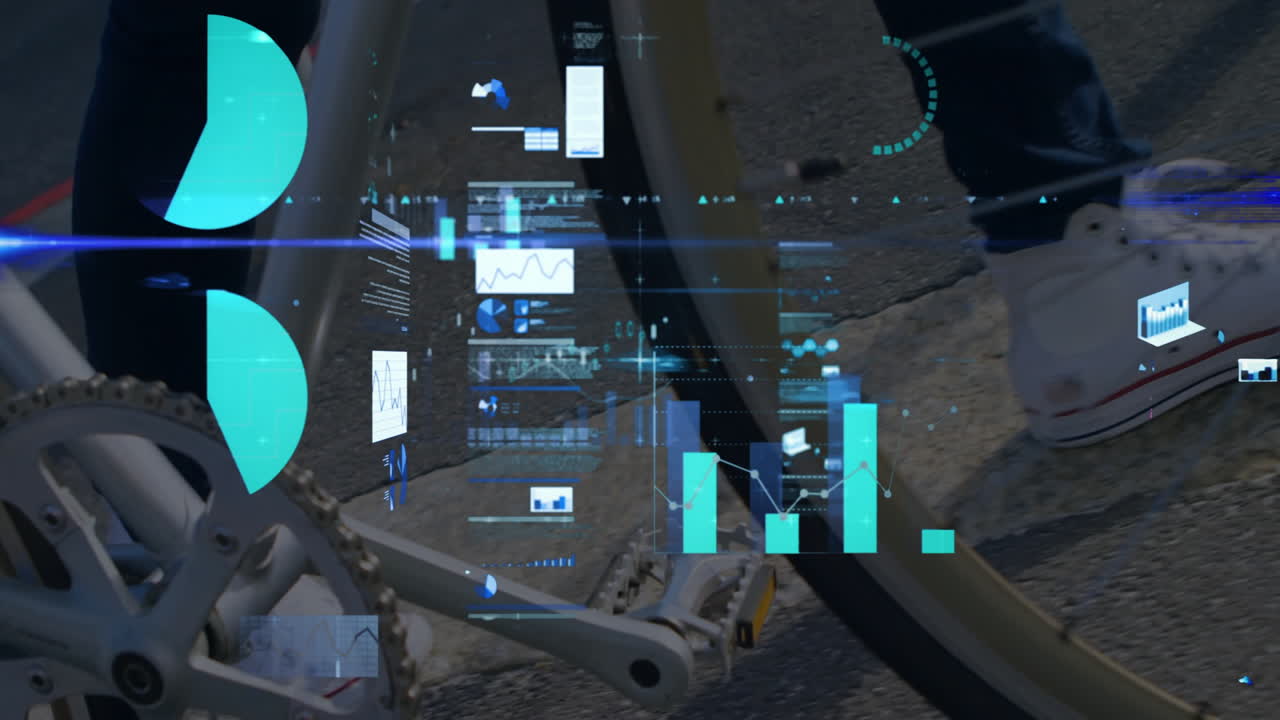 Cyclist pedaling with animation of data analytics and graphs overlaying scene