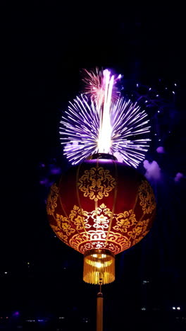 fireworks and chinese lantern at night