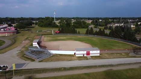 footage flying over a baseball field at a local school