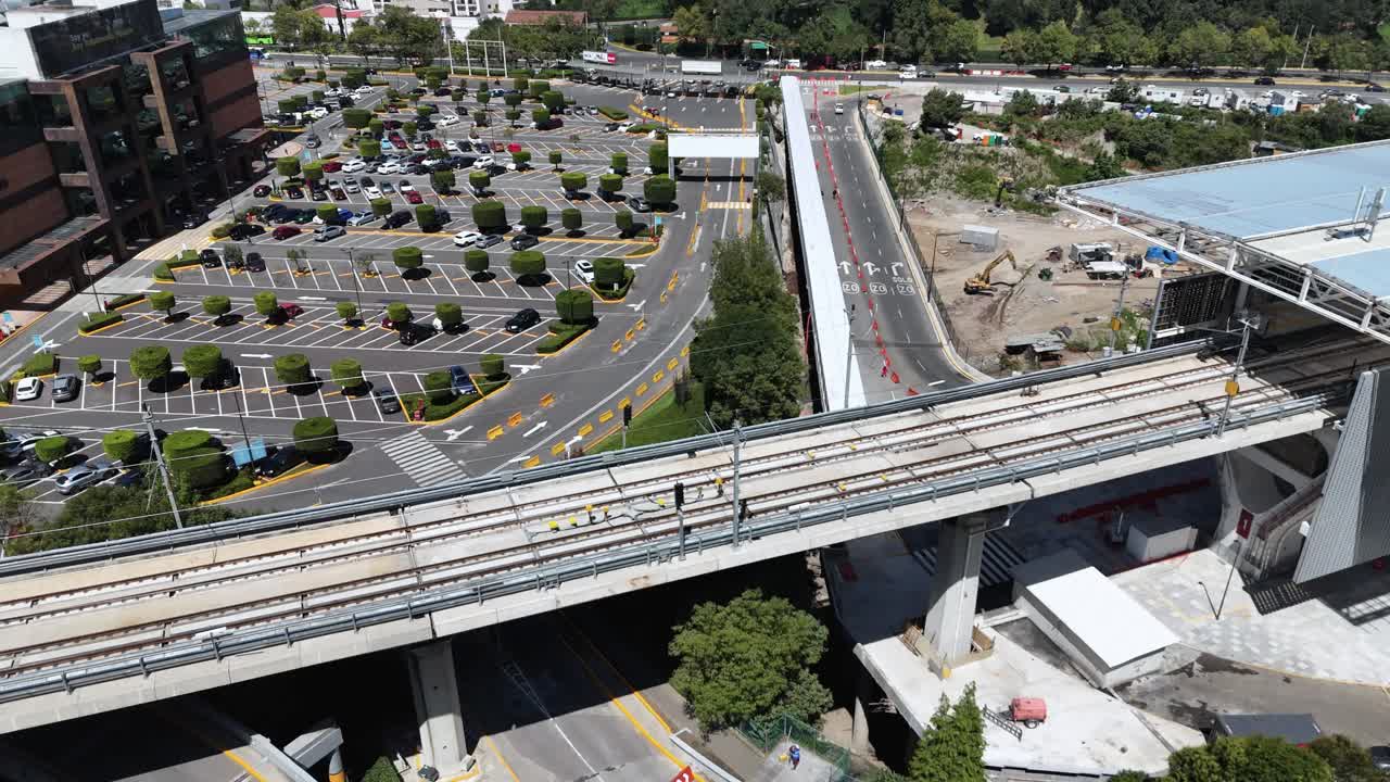 Aerial View of Light Rail Construction near Parking Lot
