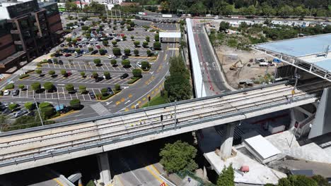 aerial view of light rail construction near parking lot