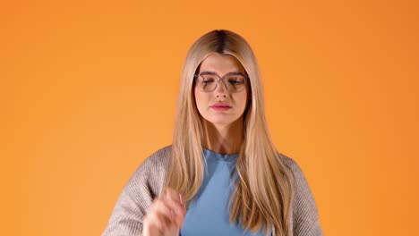 Close-up-woman-checks-forehead-for-fever-and-cleans-nose-with-napkin-and-hand