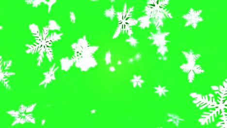 los copos de nieve que caen en la pantalla verde