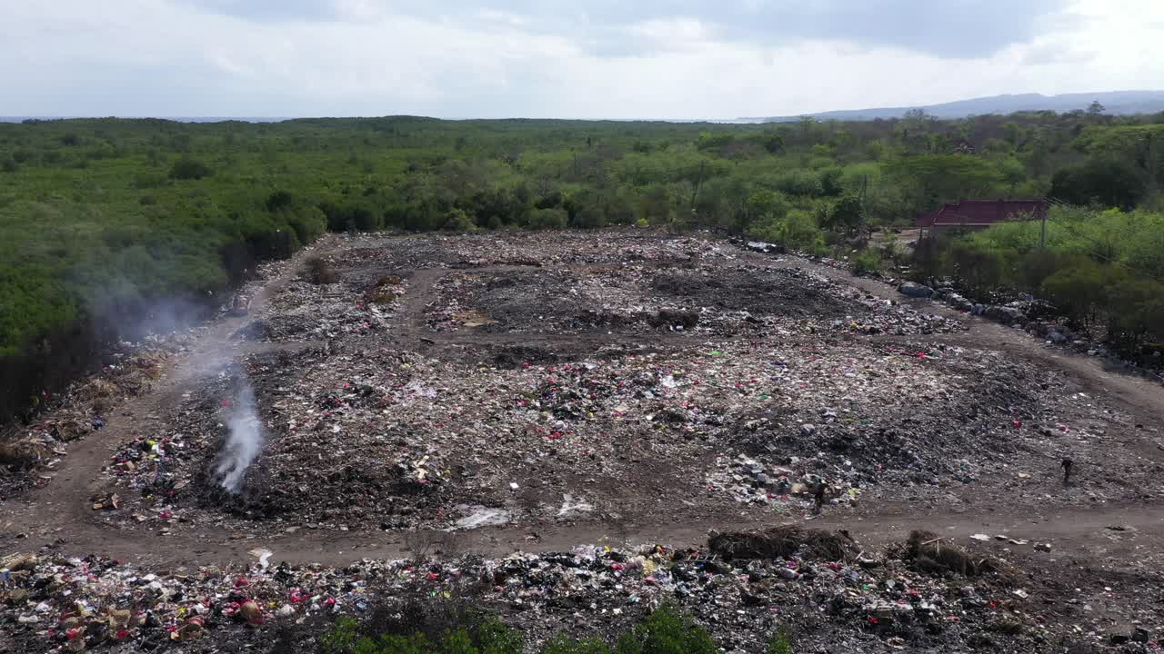 Rubbish tip, landfill, waste area in Lembongan Bali drone shot static medium