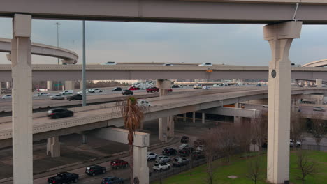 Establishing aerial shot of I-10 Freeway and Beltway 8 freeway in Houston