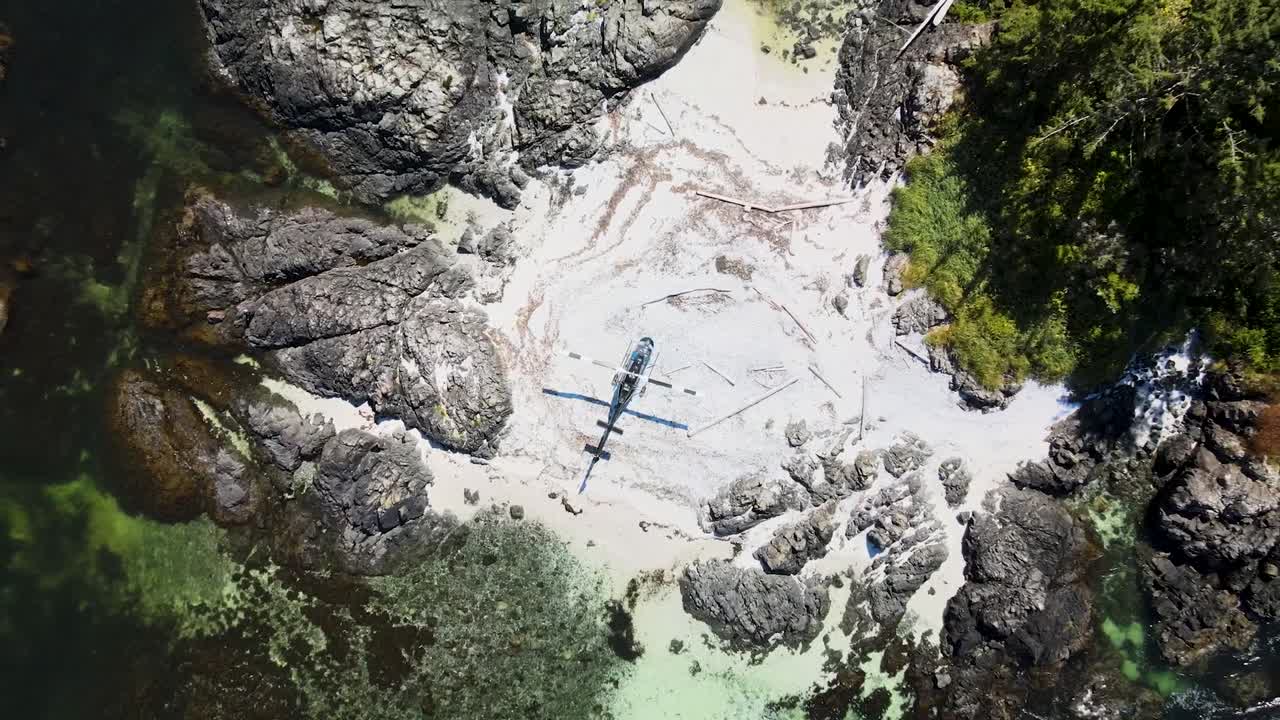 Birdseye view of helicopter on offshore island in ocean